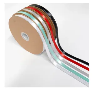 Close-up of 1cm satin ribbons with metallic edges in multiple vibrant colors