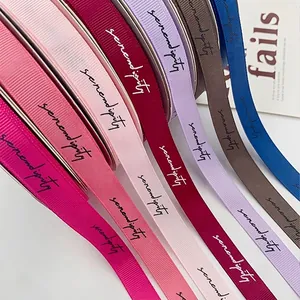 Assorted colorful grograin ribbons with serendipity lettering for flower gift packaging