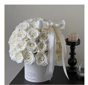 Elegant matte white round flower gift box with silk ribbon detail for DIY floral arrangements