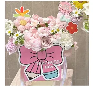 Pink bow-themed Teachers' Day gift box for flowers featuring creative pencil design details.