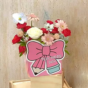 Pink Teachers' Day gift flower box with bow and pencil creative design