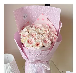 Close-up of pink pearly stone pattern textured wrapping paper for elegant bouquets.