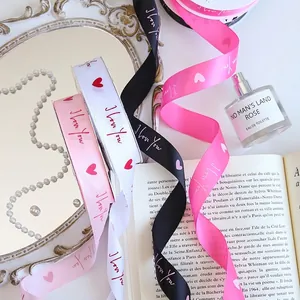 Decorative satin ribbon with heart pattern and 'I love you' for floral gift packaging