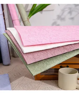 Detailed texture of multi-colored hand-kneaded stone-patterned wrinkled paper for floral DIY