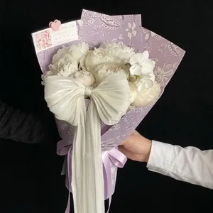 French pearlescent gauze fabric bow for bouquet decoration and flower arrangement.