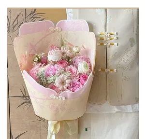 Detailed view of Chinese cheongsam style flower wrapping paper with elegant frog buttons