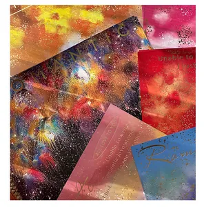 Detailed macro view of colorful firework patterned romantic gift wrapping paper.