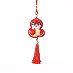 Traditional red embroidered Year of the Snake sachet charm with long silk tassel hanging