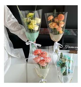 Transparent flower bouquet packaging bags with gold 'HAND BOUQUETS' lettering detail
