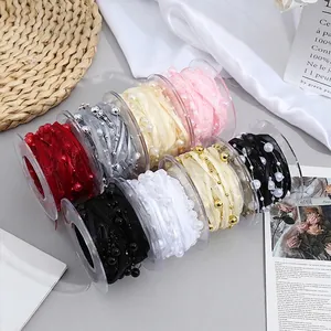 Elegant woven ribbons with pearl beads for luxury gift wrapping and floral bouquets