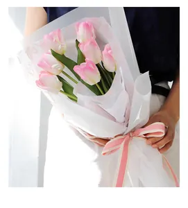 Detail view of thickened 38g retro floral Sydney paper used for wrapping pink tulip bouquets
