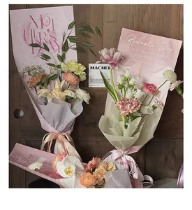 Close-up of pink Mother's Day floral wrapping paper used for elegant flower bouquets