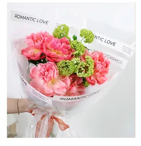 Detail of transparent flower wrapping paper with Romantic Love print and text