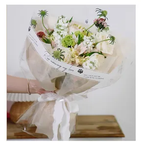 Detail of transparent waterproof OPP flower wrapping paper with elegant English print