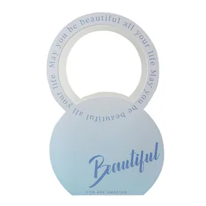 Elegant light blue circular floral gift carrier with beautiful script for DIY gifts