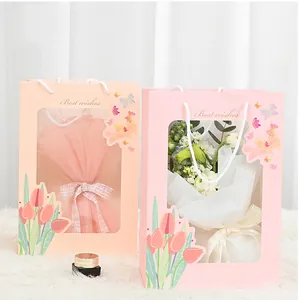 Elegant pink and peach paper gift bags featuring window and butterfly floral design