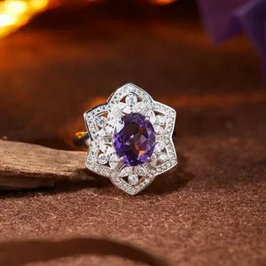 Macro shot of a vintage S925 sterling silver ring with a faceted purple amethyst stone