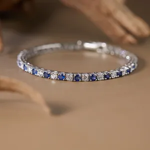 Macro detail of blue sapphire and white stone tennis bracelet in S925 silver