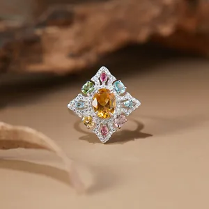 Elegant vintage S925 silver ring featuring oval citrine and multicolored gemstones.