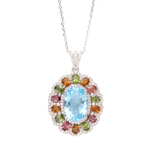 Close-up of S925 silver necklace with blue topaz and multi-color gemstones.