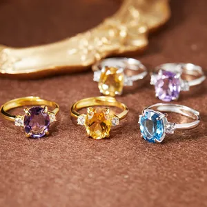 Variété de bagues en argent S925 avec améthyste, citrine et topaze bleue naturelle.
