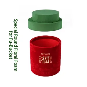 Round floral foam discs set with a red velvet Fu bucket for DIY flower arrangements