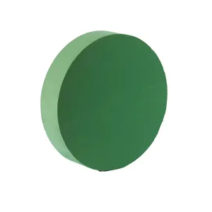 Round green water-absorbing floral foam block for flower arrangement and DIY projects