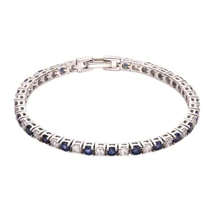 Elegant S925 silver tennis bracelet with alternating blue sapphires and clear round stones.