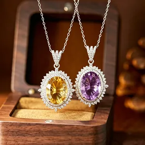 Detail of amethyst and citrine pendants with millennium cut in S925 silver settings