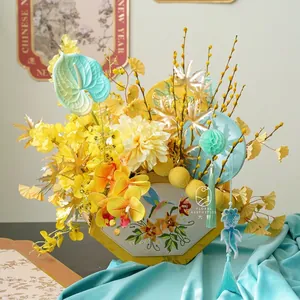 Traditional Chinese style fan-shaped floral bucket with embroidery and silk flowers.