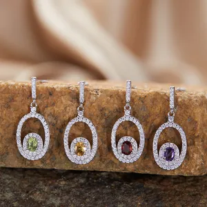 Detailed view of S925 silver earrings featuring various colorful natural gemstones