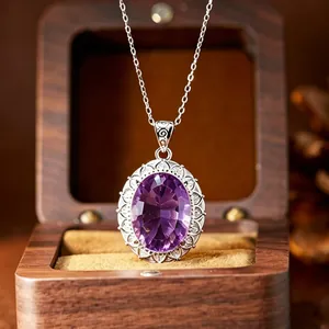 Close-up of a large oval amethyst pendant necklace in S925 sterling silver setting.