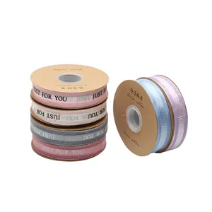 Sheer organza ribbon rolls with 'Just For You' print for gift wrapping