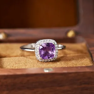 Detailed macro shot of an S925 silver Diana-style ring featuring a purple amethyst gem.