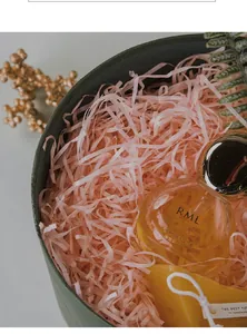 Macro detail of soft pink shredded raffia paper used as decorative gift box filler