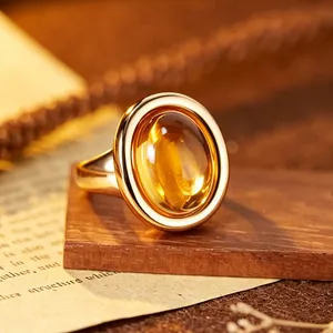 Close-up of a vintage natural citrine ring with 24K gold plating on silver.