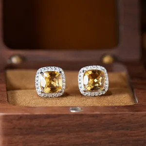 High-detail macro view of square cut yellow citrine stud earrings in S925 sterling silver