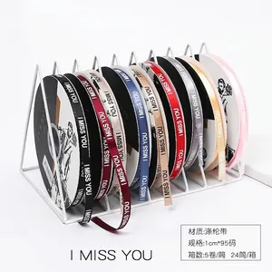 Assorti polyester satijnen lintrollen met 'I MISS YOU' print voor cadeauverpakkingen