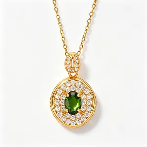 Detailed close-up of a gold-plated S925 silver necklace with a green diopside oval pendant