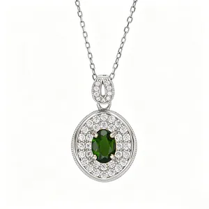 Close-up of elegant S925 sterling silver necklace featuring an oval green diopside pendant