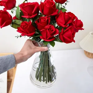 Handheld transparent conical glass vase for floral arrangements with red roses