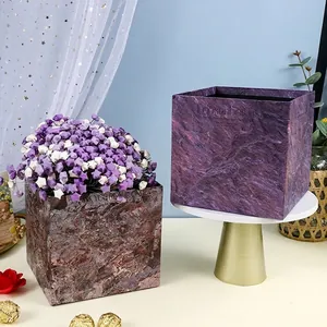 Square marble texture flower gift boxes in purple and brown tones for elegant decor.