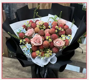 Creative fruit bouquet featuring lychees and pink roses secured with DIY fixing base support
