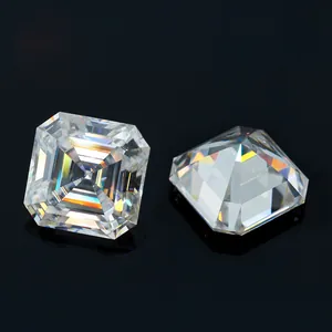 Macro detail of two Asscher cut Moissanite stones showing D-color sparkle on black