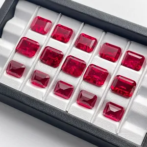 Macro view of emerald-cut lab-grown ruby gemstones with visible internal inclusions.
