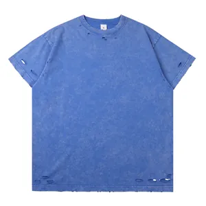 Heavyweight blue washed cotton T-shirt with vintage distressed ripped hole detail
