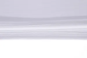 Macro detail of high-quality stitching on white quick-dry sports t-shirt fabric