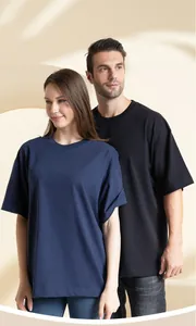 Close-up view of unisex 300g heavyweight cotton oversized t-shirts worn by models