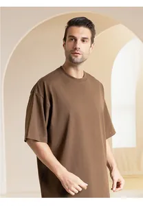 Brown 300g heavyweight cotton oversized crew neck t-shirt shown on a male model