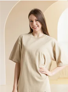 Detailed view of oversized 300g heavyweight cotton beige T-shirt texture and fit.